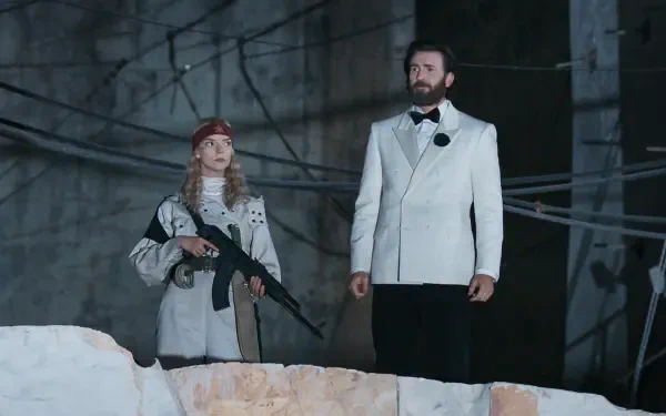 Anya Taylor-Joy with a rifle beside Chris Evans in a white suit in Sacrifice (2026), HD PC desktop wallpaper and background.