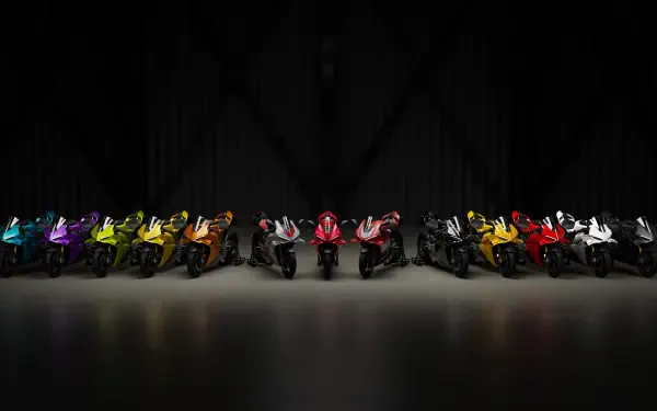 4K Ultra HD desktop wallpaper featuring a colorful lineup of Ducati Panigale V4 sport bikes against a black background.