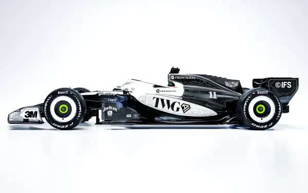 Cadillac MAC-26 F1 race car in a crisp side profile, featured in an 8K Ultra HD PC desktop wallpaper and background.