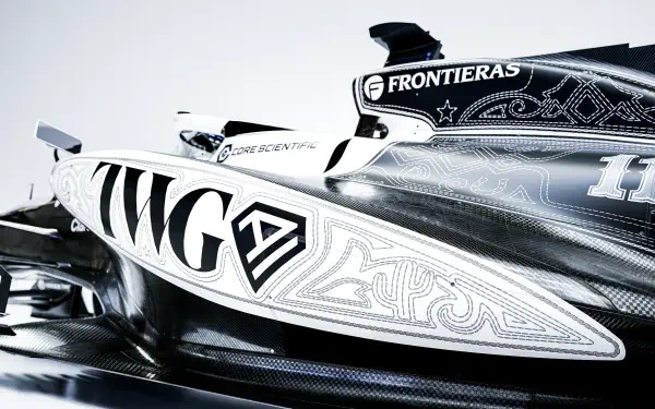 Cadillac MAC-26 powerboat in striking black-and-white Cadillac F1 Team livery, featured in an 8K Ultra HD desktop wallpaper.