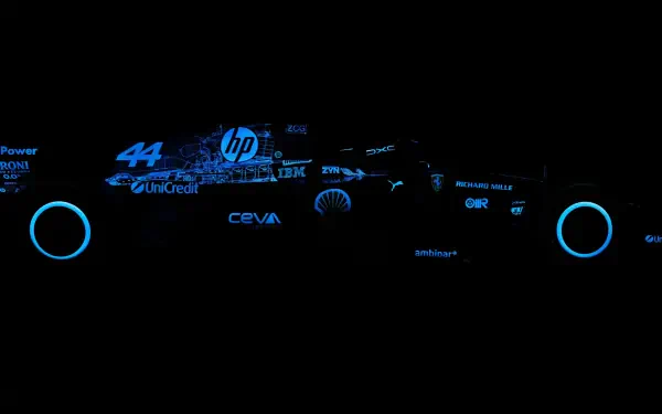 Ferrari SF-26 Formula 1 branding and sponsor logos glow blue against a black 4K Ultra HD PC desktop wallpaper background.