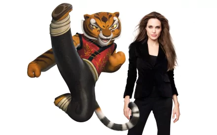 A dynamic HD wallpaper featuring Tigress from Kung Fu Panda, alongside Angelina Jolie. The image blends animation and live-action for a striking visual effect.