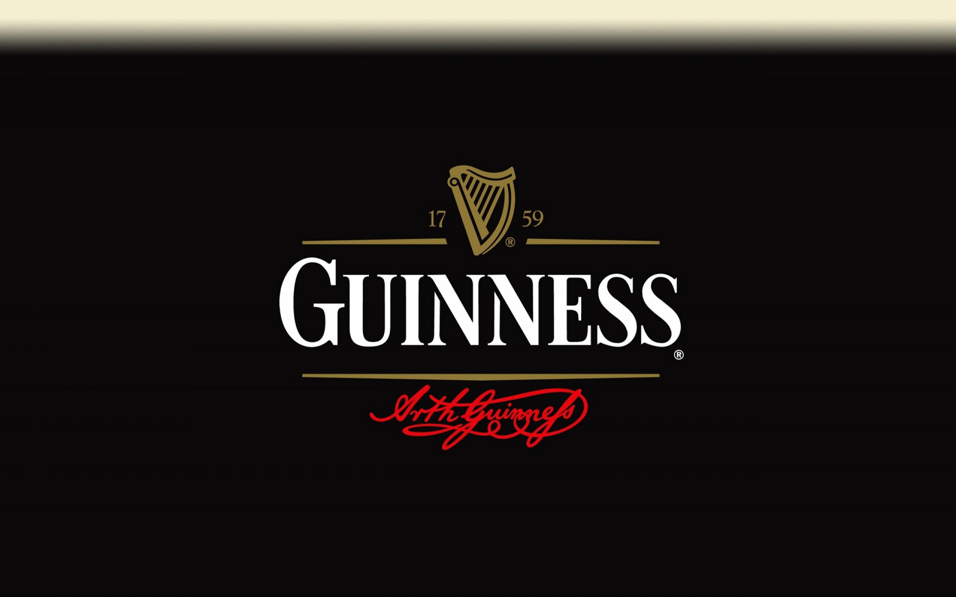 A sleek black background featuring the iconic Guinness logo, representing the rich heritage of this famous beer. A striking HD desktop wallpaper for enthusiasts.
