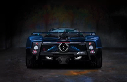 Rear view of a dark blue Pagani Zonda Tricolore supercar showcased as a high-definition PC desktop wallpaper and background.