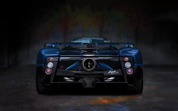 Rear view of a dark blue Pagani Zonda Tricolore supercar showcased as a high-definition PC desktop wallpaper and background.