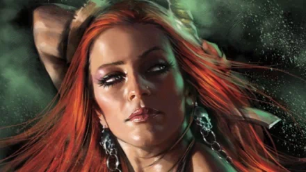 HD comic-style wallpaper featuring Queen Sonja with flowing red hair and intense gaze, set against a dark, atmospheric background.