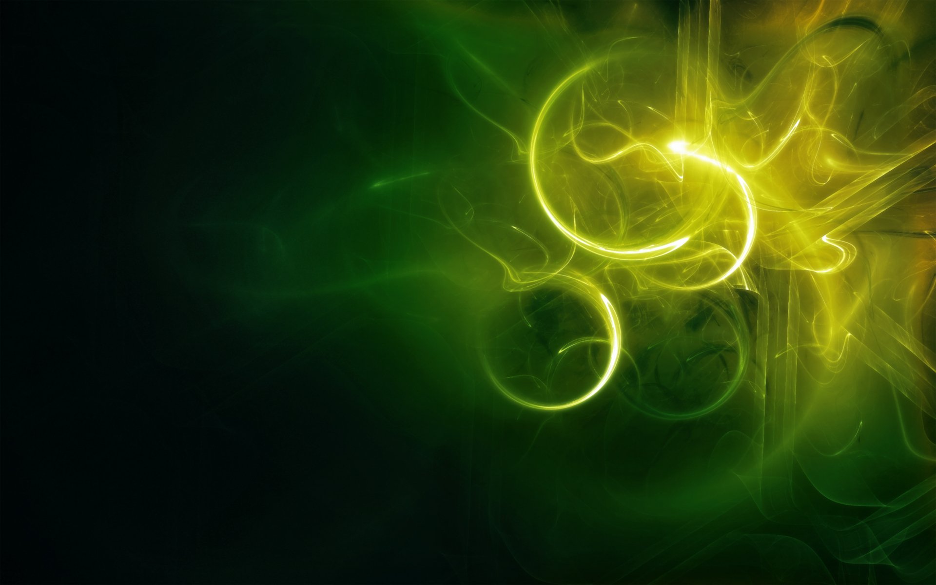 Abstract green 2K Quad HD PC desktop wallpaper featuring glowing neon rings and smoky wisps forming swirling, luminous patterns across a deep green background.
