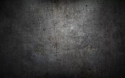 Abstract texture featuring a dark, scratched surface. This HD desktop wallpaper adds depth and a modern aesthetic to any PC background.