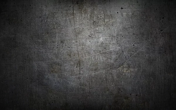 Abstract texture featuring a dark, scratched surface. This HD desktop wallpaper adds depth and a modern aesthetic to any PC background.