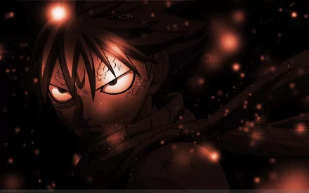 HD desktop wallpaper featuring Natsu Dragneel from the anime Fairy Tail, with a dark background illuminated by glowing orange sparks.