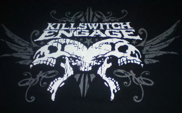 HD PC desktop wallpaper featuring a dark, edgy design with twin skulls and wings, prominently displaying the band name Killswitch Engage in a bold, distressed font.