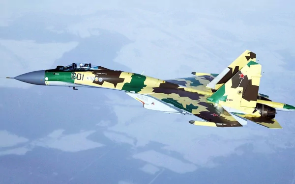 A Sukhoi Su-35 warplane soars through the sky, showcasing its striking camouflage design. This HD wallpaper captures the essence of modern military aircraft.