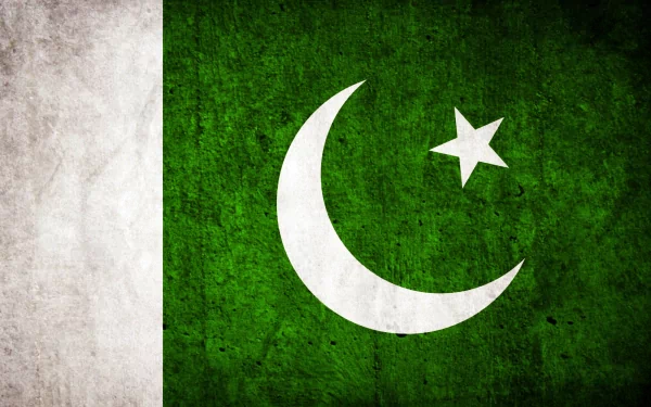 HD PC desktop wallpaper featuring the flag of Pakistan with a textured green field, white crescent moon, star, and vertical white stripe on the left.