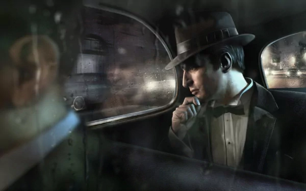 A man in a suit and hat sits thoughtfully in a car at night, featuring a scene from the video game Mafia II. The HD desktop wallpaper showcases a moody, immersive atmosphere.