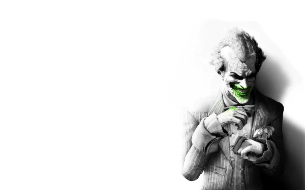 High-definition desktop wallpaper featuring the Joker from the video game Batman: Arkham City, showcasing his iconic smile and menacing presence against a stark background.