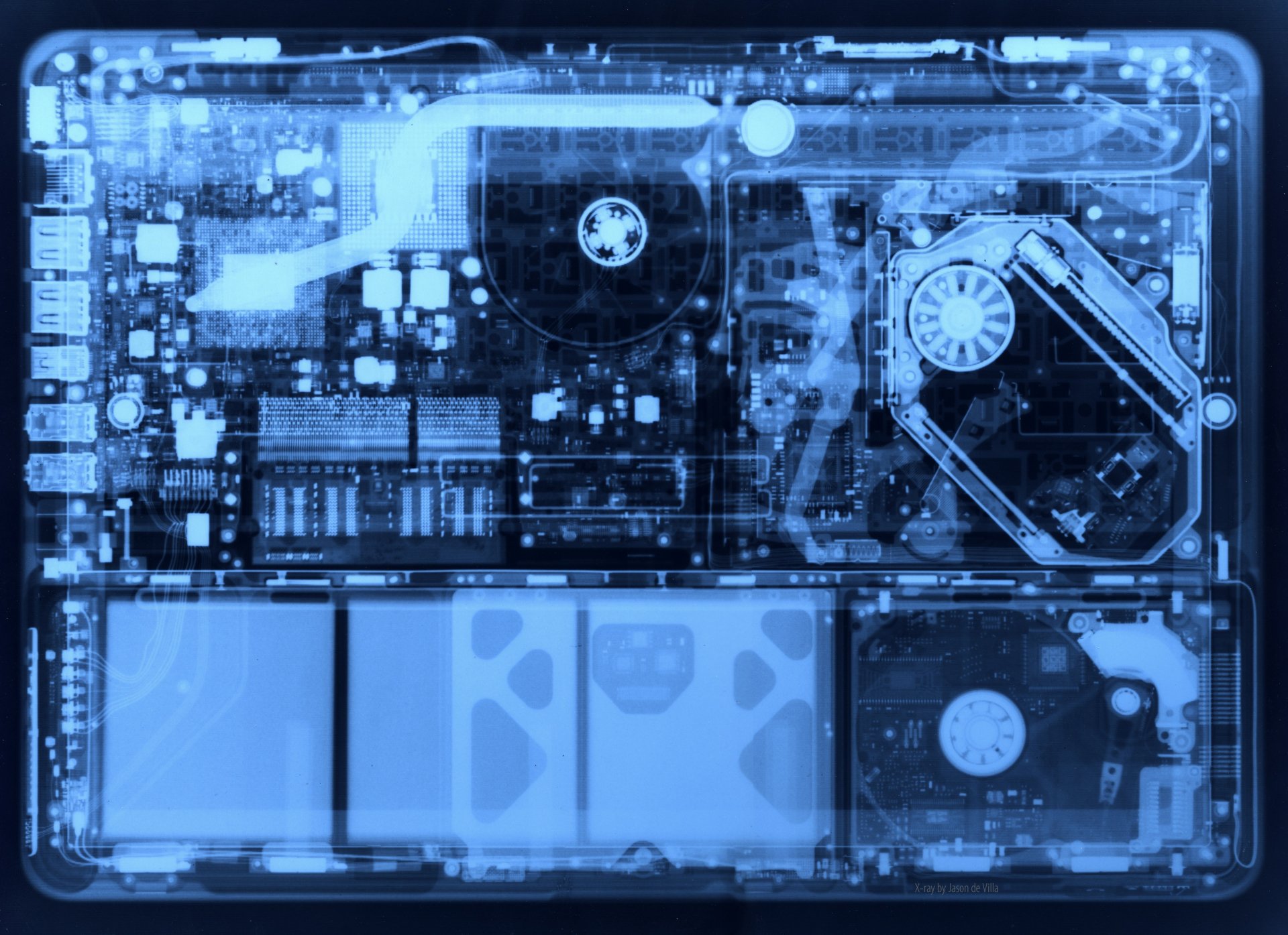 Close-up 4K Ultra HD PC desktop wallpaper showcasing intricate technology circuits and hard drive components in a translucent blue-toned design.