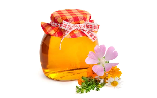 A vibrant jar of honey adorned with a checkered lid, surrounded by colorful flowers and greenery, creating an inviting food-themed HD desktop wallpaper.