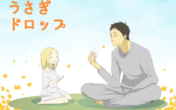 Anime HD PC desktop wallpaper featuring two characters from Usagi Drop sitting and interacting on grass under a bright sky, with Japanese text in the top left corner.