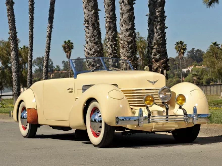 Vintage cream-colored convertible vehicle parked outdoors with palm trees in the background, featured as an HD PC desktop wallpaper and background.