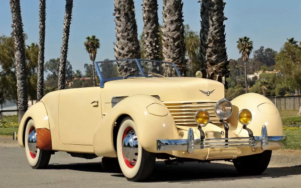 Vintage cream-colored convertible vehicle parked outdoors with palm trees in the background, featured as an HD PC desktop wallpaper and background.