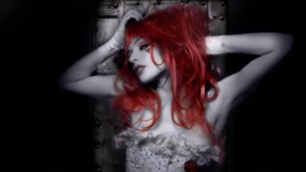 HD wallpaper of American singer Emilie Autumn with striking red hair, posing in a dramatic fall-inspired setting.