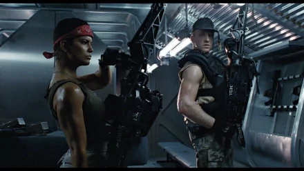 HD PC desktop wallpaper featuring intense characters armed and ready inside a sci-fi spaceship, inspired by the movie Alien.
