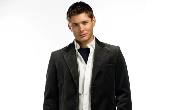 HD PC desktop wallpaper featuring celebrity Jensen Ackles in a casual black jacket and white shirt against a plain white background.