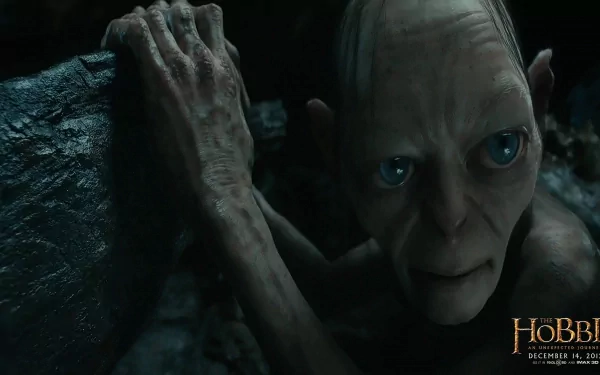 4K Ultra HD desktop wallpaper featuring Gollum from the movie The Hobbit: An Unexpected Journey, highlighting his intense gaze and shadowy cave surroundings.