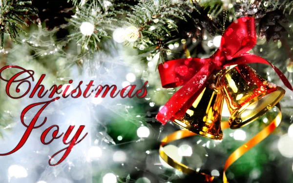 A festive desktop wallpaper featuring shiny gold bells adorned with a red ribbon, surrounded by sparkling Christmas ornaments and lights, capturing the essence of holiday joy.