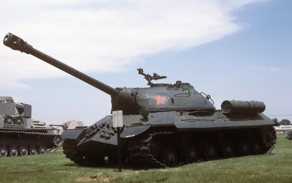 HD PC desktop wallpaper showcasing a military scene with an IS tank family under a clear sky.