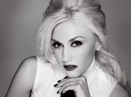A striking black-and-white portrait of Gwen Stefani, showcasing her signature style and bold makeup, serves as an engaging HD PC desktop wallpaper and background.