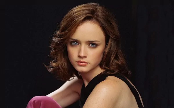 HD PC desktop wallpaper featuring a close-up portrait of celebrity Alexis Bledel against a dark background.