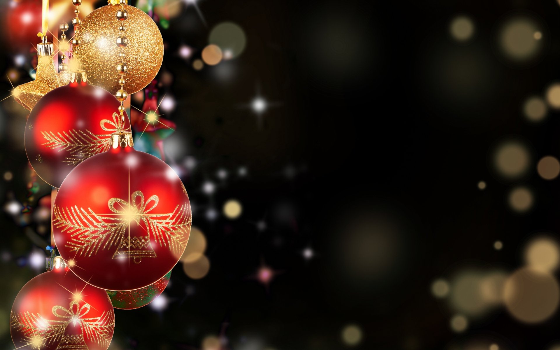A festive arrangement of Christmas ornaments, featuring vibrant red and gold designs against a dark background, creating a joyful holiday atmosphere.