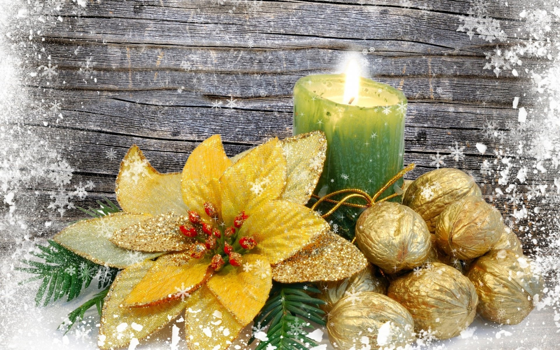 A festive HD desktop wallpaper featuring a green candle, a golden flower, and decorative ornaments, set against a snowy background, capturing the spirit of Christmas.
