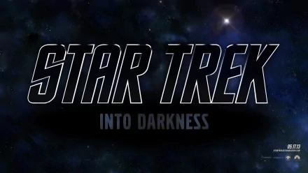 HD desktop wallpaper featuring the logo for Star Trek Into Darkness set against a starry space background.