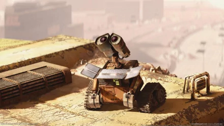 HD PC desktop wallpaper of Wall·E (movie): the small rusty robot perched on a sunlit rooftop, eyes raised toward a dusty, desolate horizon.