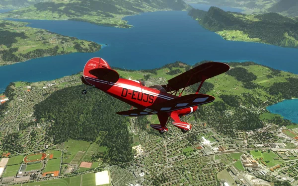 HD wallpaper of a red Aerofly FS biplane flying over a realistic landscape with a lake and mountains in the background.