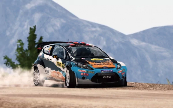 HD wallpaper of a WRC 3 rally car speeding on a gravel road with mountains in the background.