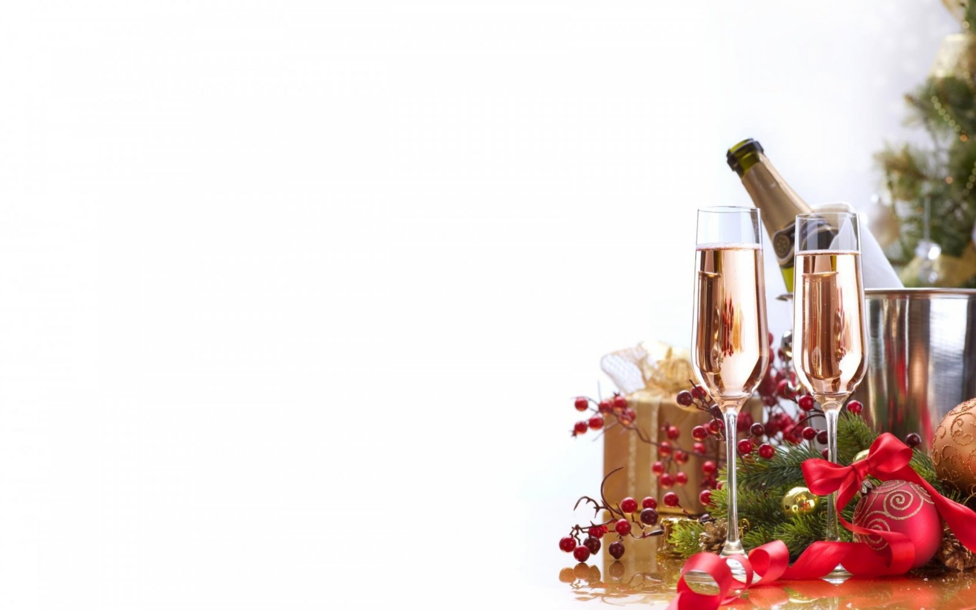 HD PC desktop wallpaper featuring a festive New Year holiday scene with champagne glasses, a bottle, wrapped gifts, and seasonal decorations on a white background.