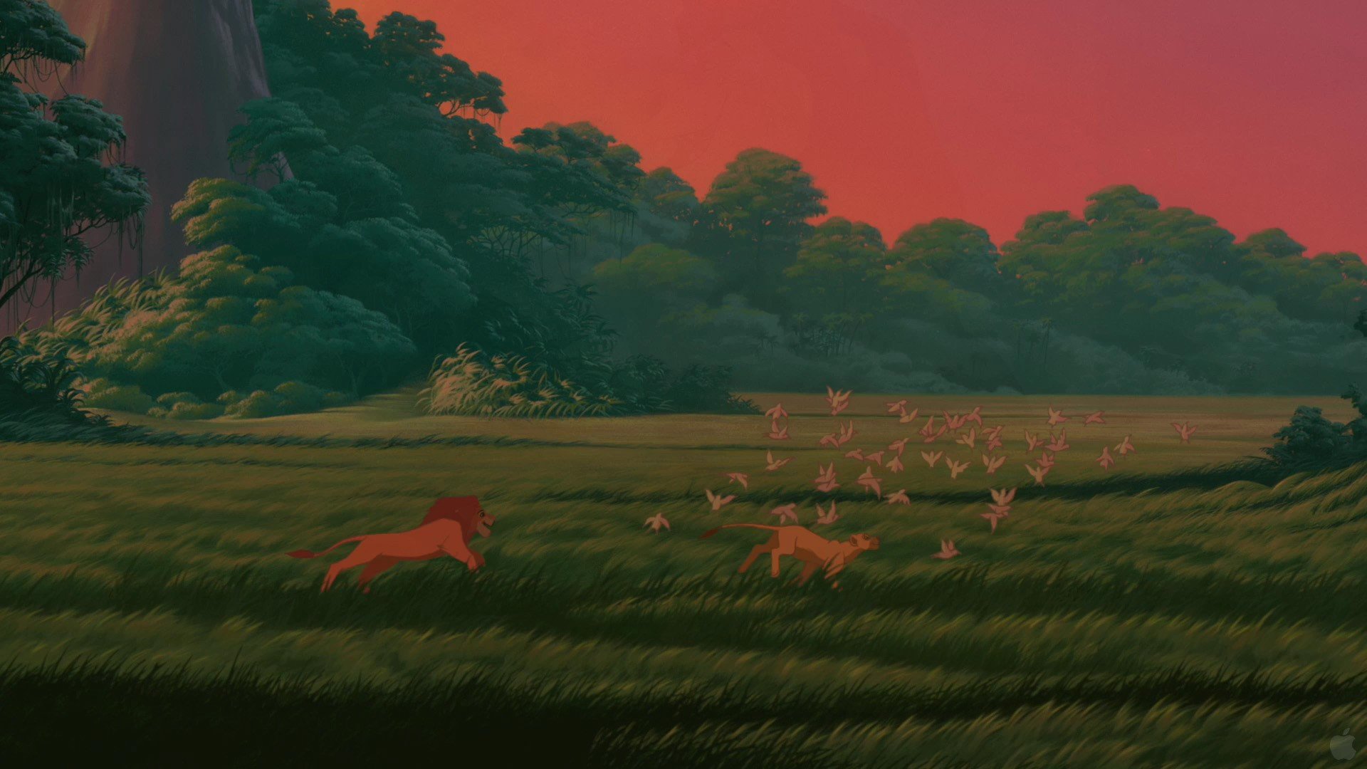 HD wallpaper of The Lion King (1994) showcasing a lion with a group of antelopes in a vivid savannah landscape.