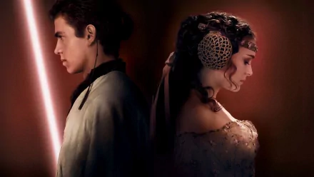 A visually striking HD wallpaper featuring Anakin Skywalker and Padmé Amidala from Star Wars Episode II: Attack Of The Clones, set against a dramatic background.