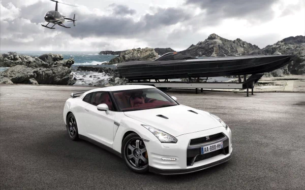 HD desktop wallpaper featuring a white Nissan Egoist car parked near a sleek black boat with a helicopter flying overhead against a rocky coastline backdrop.