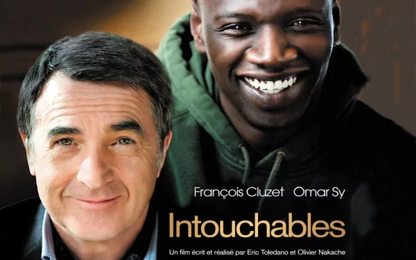 HD desktop wallpaper featuring two men smiling from the movie Intouchables, suitable as a background image.
