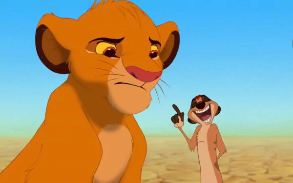 HD wallpaper featuring young Simba and Timon from The Lion King (1994) against a desert backdrop.