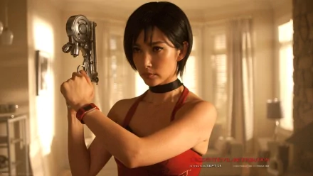 A high-definition desktop wallpaper from Resident Evil: Retribution, featuring a determined character wielding a gun in a brightly lit room.