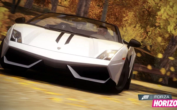HD PC desktop wallpaper featuring a sleek white sports car racing through autumn foliage from the video game Forza Horizon.