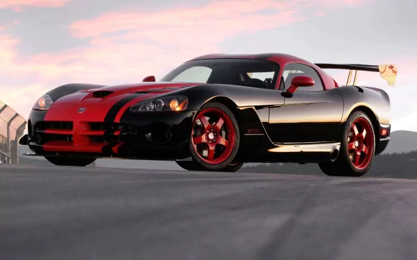 A black and red Dodge Viper sports car with striking red accents, captured as a high-definition desktop wallpaper and background.