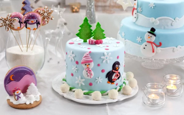 A festive Christmas scene featuring a beautifully decorated blue cake adorned with snowflakes, a penguin, and a snowman, alongside holiday sweets and treats, creating a joyful atmosphere.