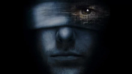 HD wallpaper featuring a close-up from Minority Report with a man's face partly obscured by digital imagery.