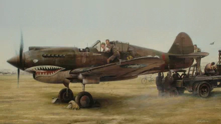 A detailed HD desktop wallpaper featuring a military aircraft, showcasing a vintage plane with crew members preparing for flight in a rugged outdoor setting.